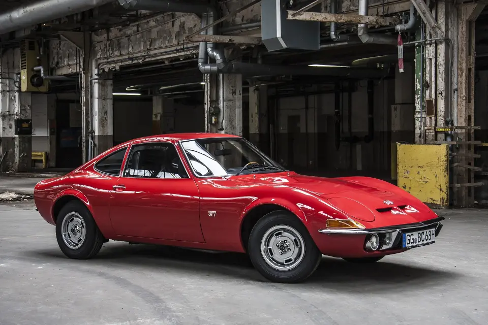 Classic red Opel car undergoing auto repair and maintenance in Phoenix, Arizona.